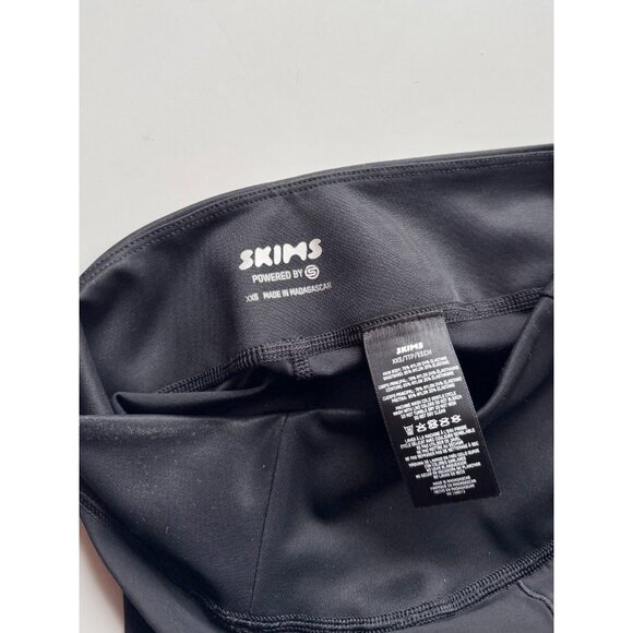 NWT SKIMS x SKINS Black Performance High Waisted 7/8 Leggings, Size XXS - Picture 14 of 16